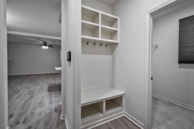 mudroom with wood-type flooring