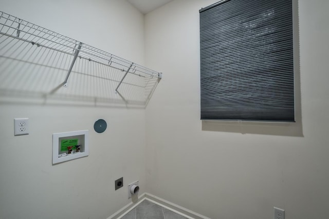 laundry room with tile patterned flooring, washer hookup, and hookup for an electric dryer