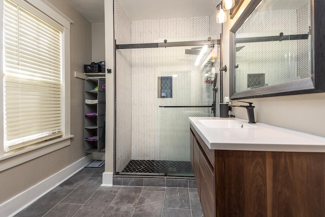 bathroom with vanity, tile patterned floors, and an enclosed shower