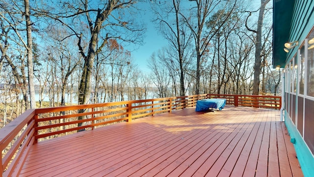 deck featuring a water view