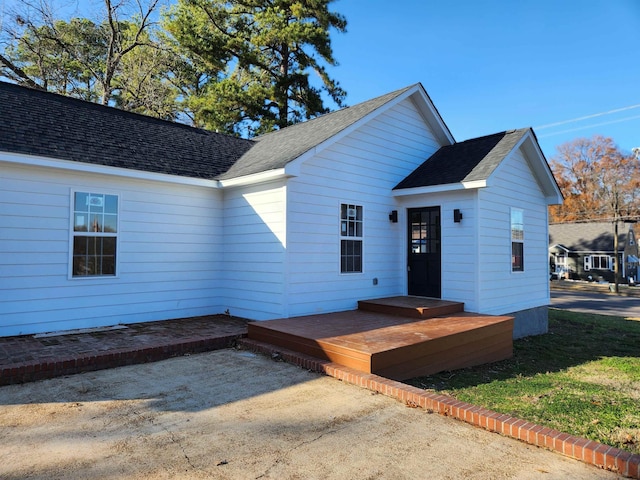 view of front of home with a deck