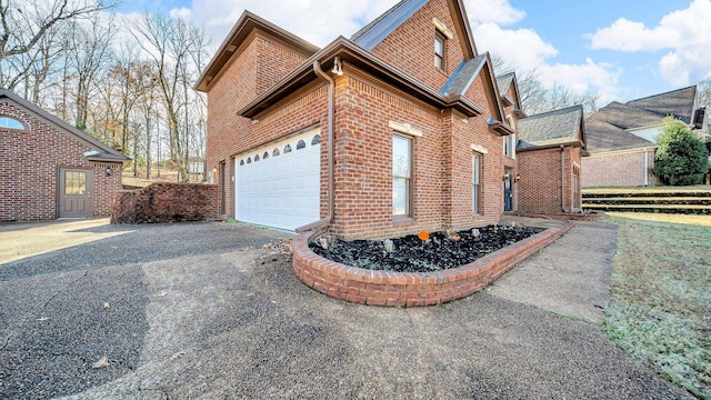 view of home's exterior with a garage