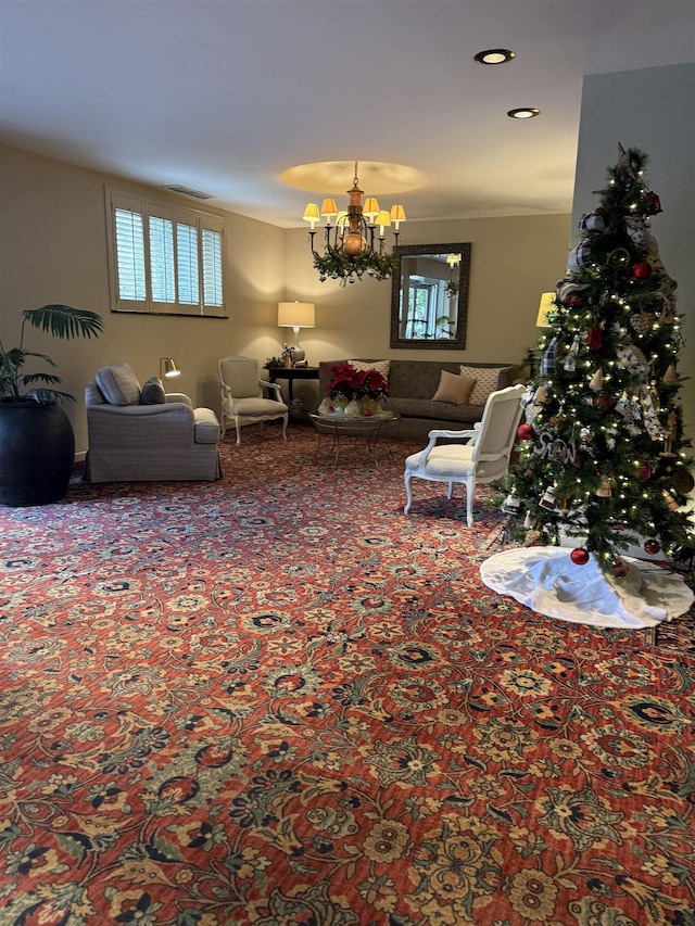 living room featuring a chandelier