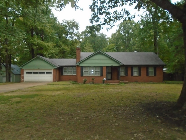 ranch-style house with a front yard and a garage