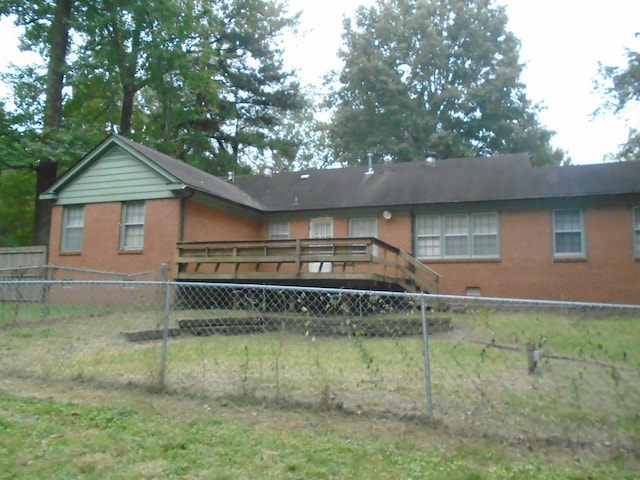 rear view of house with a deck