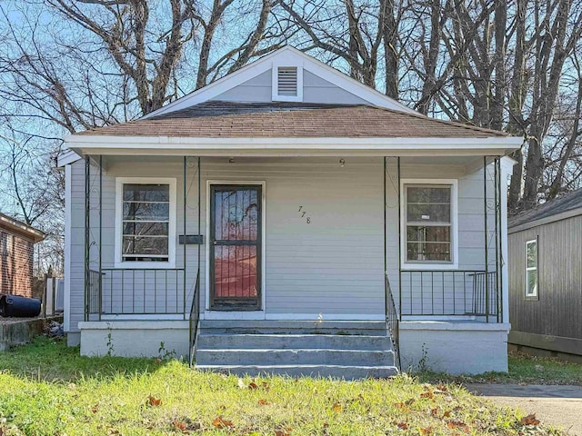 bungalow-style home with covered porch