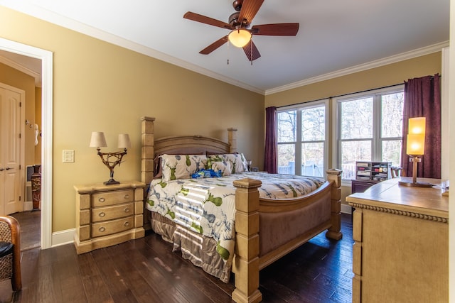 bedroom featuring ceiling fan, dark wood-type flooring, and ornamental molding