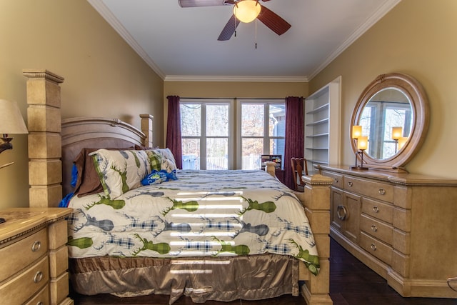 bedroom featuring dark hardwood / wood-style flooring, ceiling fan, and crown molding