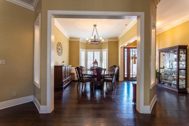 dining room featuring ornamental molding, an inviting chandelier, and dark wood-type flooring