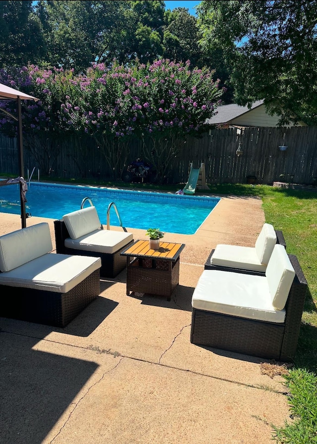 view of pool with a patio area