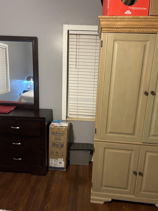 bedroom featuring dark hardwood / wood-style floors