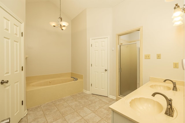 bathroom with vaulted ceiling, shower with separate bathtub, vanity, tile patterned floors, and an inviting chandelier