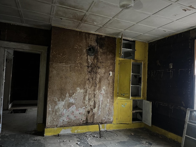 miscellaneous room featuring a drop ceiling