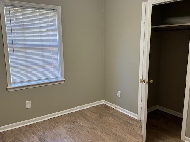 3245 Sinclair Dr, Memphis, TN 38127 - unfurnished bedroom with wood finished floors