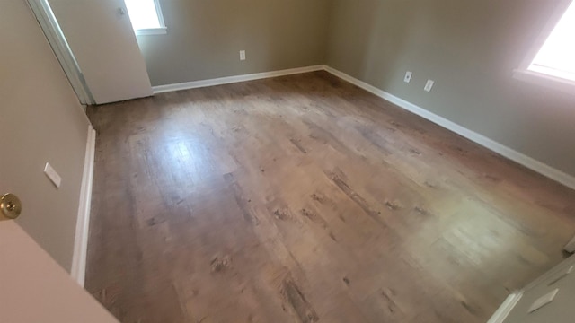 spare room featuring light hardwood / wood-style flooring