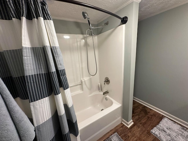 bathroom with shower / bath combo, a textured ceiling, crown molding, and hardwood / wood-style floors