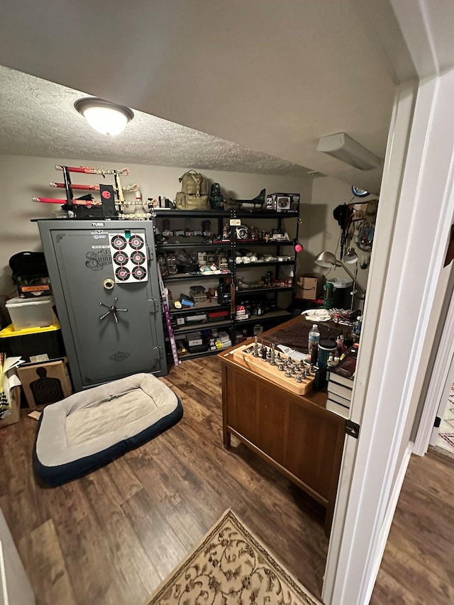 walk in closet featuring dark wood-type flooring