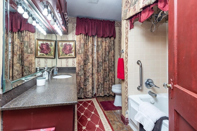 full bathroom with shower / bathing tub combination, vanity, and toilet