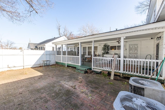 back of property featuring a patio and central AC unit