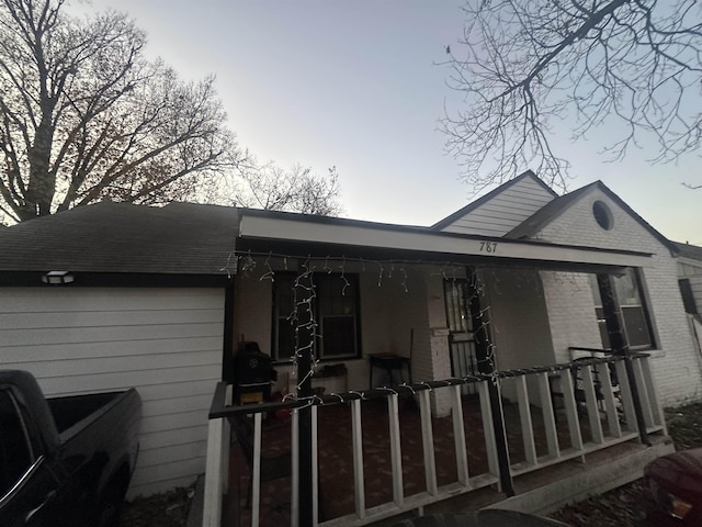 view of home's exterior with a porch