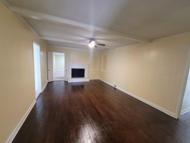 unfurnished living room featuring a fireplace, beam ceiling, ceiling fan, and dark wood-type flooring