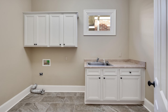 laundry area with cabinets, hookup for a washing machine, electric dryer hookup, and sink