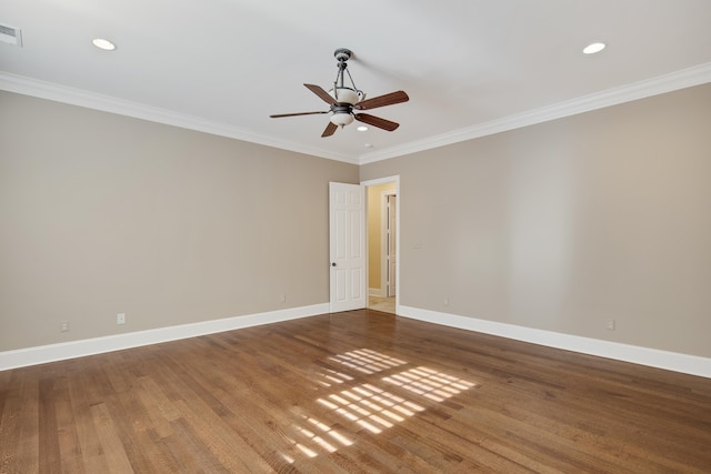 empty room with ceiling fan, wood-type flooring, and crown molding