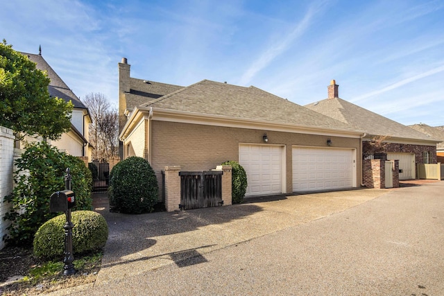 view of home's exterior with a garage