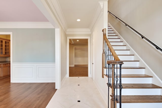 staircase with crown molding