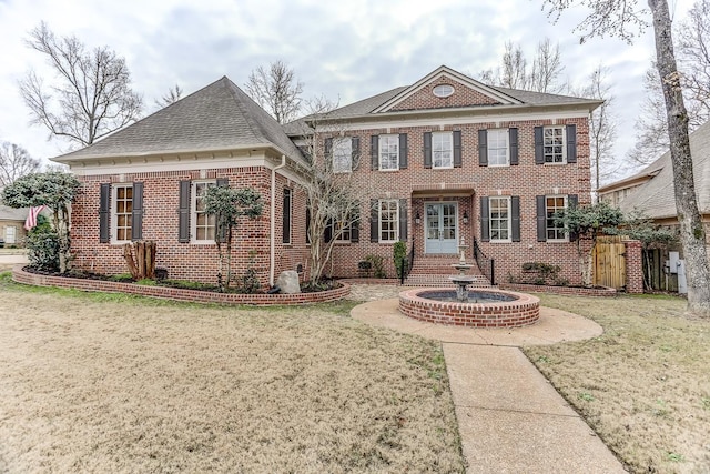 view of front of house with a front lawn