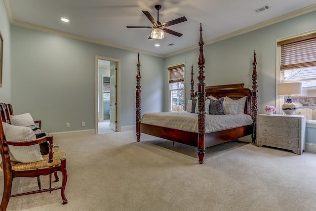 bedroom with light carpet, ceiling fan, and ornamental molding