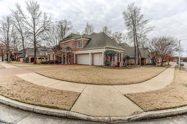 view of side of property with a garage