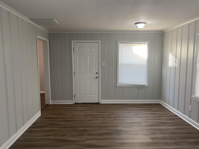 interior space with dark hardwood / wood-style flooring