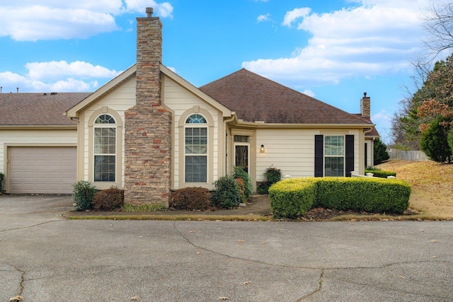 view of front of property with a garage