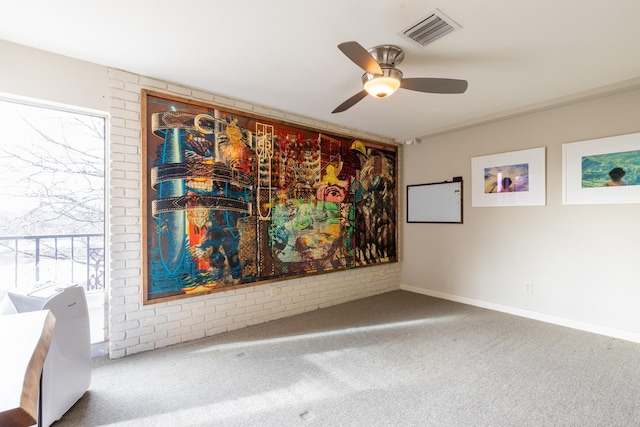 carpeted empty room with ceiling fan