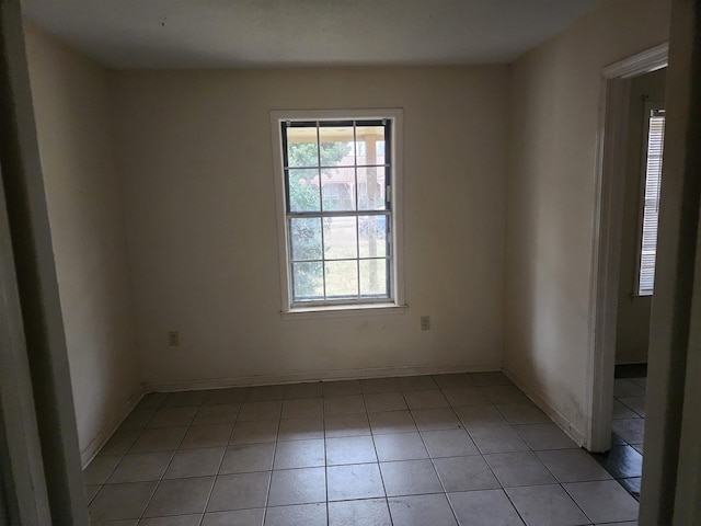 view of tiled spare room