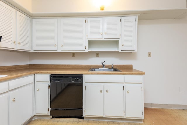 kitchen featuring white cabinetry, dishwasher, and sink