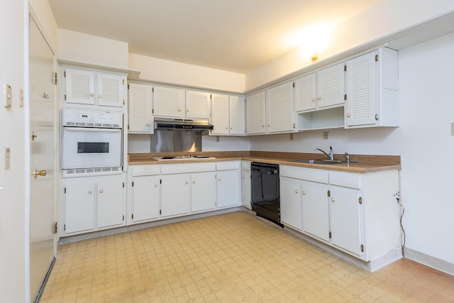 kitchen with white cabinets, sink, black dishwasher, and white oven