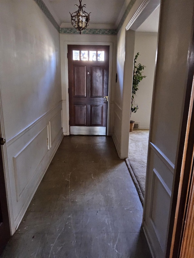 doorway with a chandelier