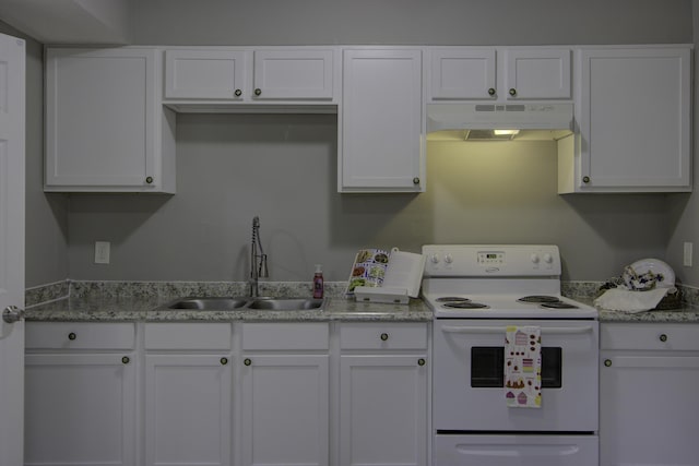 kitchen featuring under cabinet range hood, white range with electric stovetop, white cabinetry, and a sink