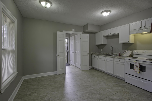 kitchen featuring white cabinetry, light stone countertops, electric stove, and sink