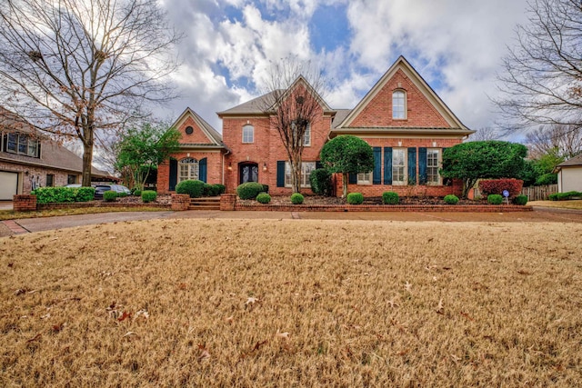 view of front of property with a front lawn