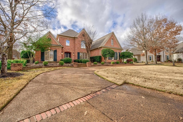 view of property with a front lawn