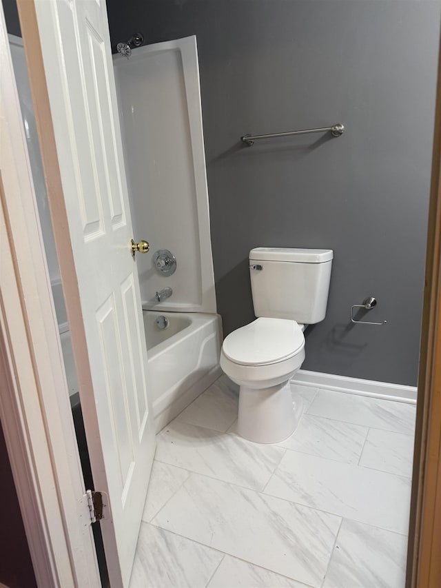 bathroom featuring  shower combination and toilet