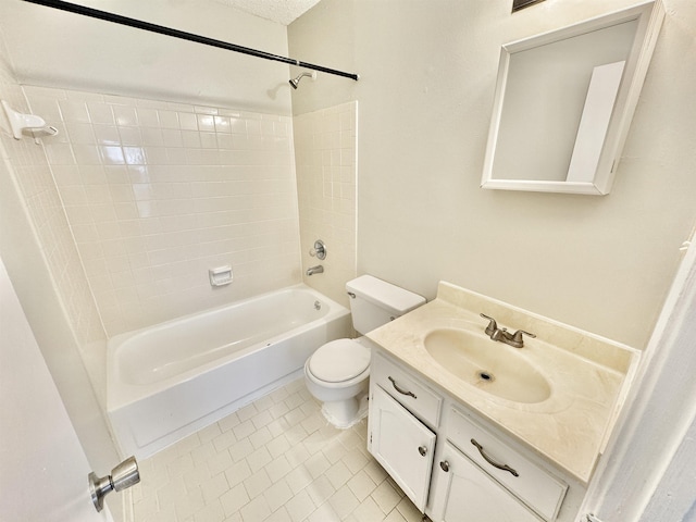 full bathroom with tile patterned floors, shower / washtub combination, vanity, and toilet