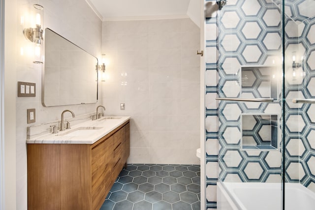 bathroom featuring tile patterned flooring, vanity, tile walls, and toilet