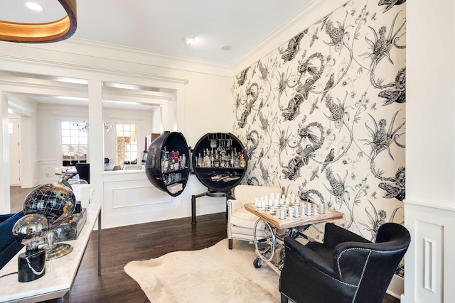 home office with dark hardwood / wood-style flooring and ornamental molding