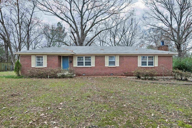 ranch-style house featuring a front lawn