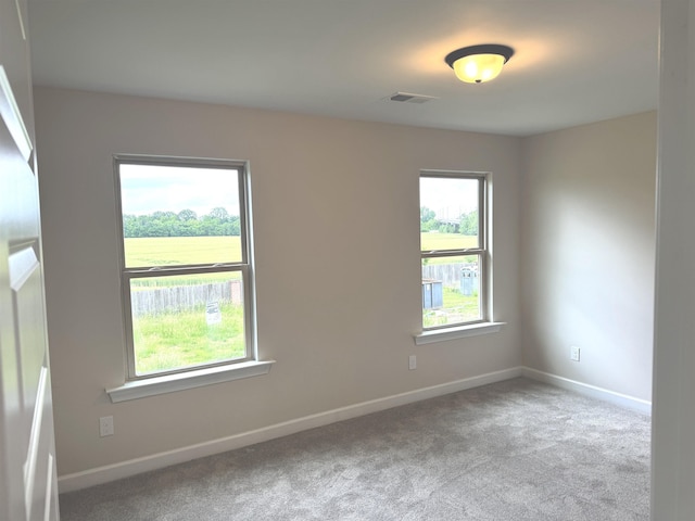 5549 Shipp Rd, Millington, TN 38053 - carpeted spare room featuring plenty of natural light and baseboards