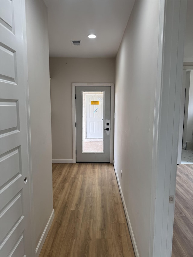 5549 Shipp Rd, Millington, TN 38053 - doorway with wood finished floors, baseboards, and recessed lighting